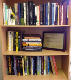 Image of the plaque on Thibeault's bookshelf